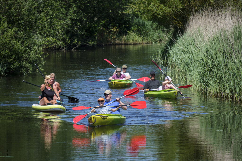 Canoeing on the Den Helder canoe route with stand-up paddleboarders